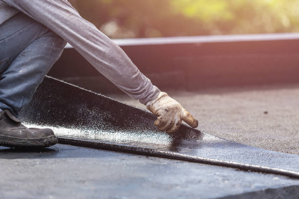 Professional Basement Waterproofing technician working in Athens, PA